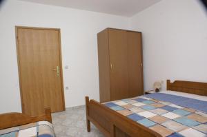 Łóżko lub łóżka w pokoju w obiekcie Apartment Zubovici 4130e