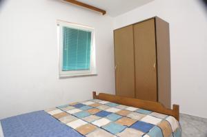 Łóżko lub łóżka w pokoju w obiekcie Apartment Zubovici 4130e