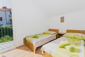 Posteľ alebo postele v izbe v ubytovaní Apartment Slatine 1126b