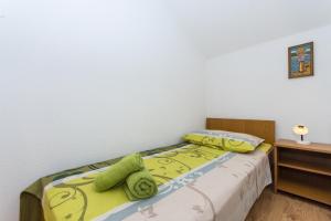 Posteľ alebo postele v izbe v ubytovaní Apartment Slatine 1126b