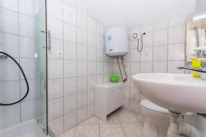 Kúpeľňa v ubytovaní Apartment Slatine 1126b