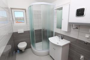 Koupelna v ubytování Apartment Kustici 4086e