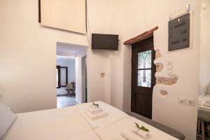 Posteľ alebo postele v izbe v ubytovaní Marthas DeLight Rooms