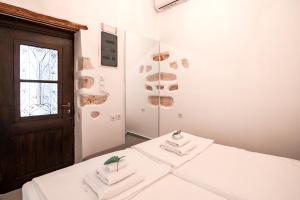 Posteľ alebo postele v izbe v ubytovaní Marthas DeLight Rooms