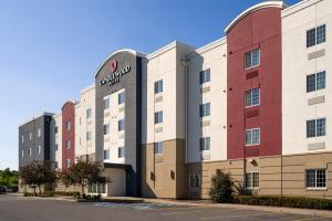 a rendering of the exterior of a hotel at Candlewood Suites Watertown Fort Drum, an IHG Hotel in Evans Mills