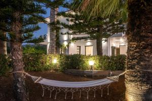 A garden outside DIEVANDI SEAVIEW VILLA