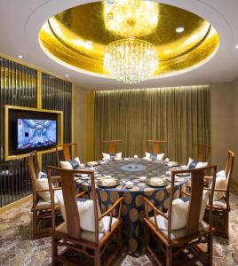 TV a/nebo společenská místnost v ubytování Swissôtel Guangzhou
