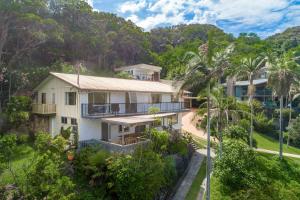 an aerial view of a house with trees at Wategos Surf Shack in Byron Bay