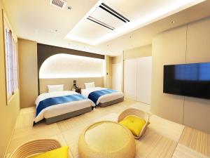 Postel nebo postele na pokoji v ubytování Hotel Abest Grande Takatsuki