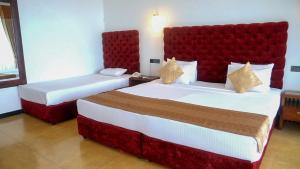 Letto o letti in una camera di Samudra Beach Resort