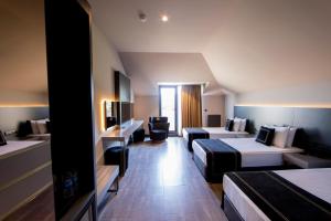 Cama ou camas em um quarto em MENALO HOTEL PREMIUM ISTANBUL AIRPORT