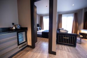 Cama ou camas em um quarto em MENALO HOTEL PREMIUM ISTANBUL AIRPORT
