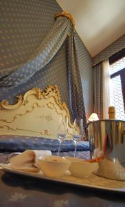 Postel nebo postele na pokoji v ubytování Hotel Torino