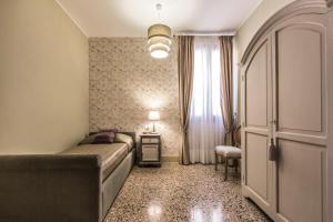 Posteľ alebo postele v izbe v ubytovaní Palazzina Canal
