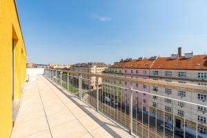 a view from the balcony of a building at Penthouse # 81 with panoramic city view in Elite Rezidence with free parking in Prague