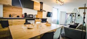 Kuchyň nebo kuchyňský kout v ubytování loft industriel L'Idaho