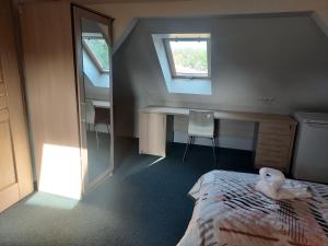 Postel nebo postele na pokoji v ubytování WOSiR Drzonków