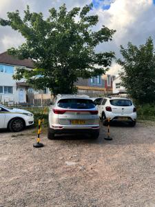 a group of cars parked in a parking lot at City Beach AirBnB Southend on Sea, in Southend-on-Sea