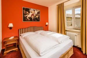 Postel nebo postele na pokoji v ubytování Hotel Traube
