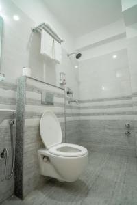 Vannituba majutusasutuses Madhuban Hotel