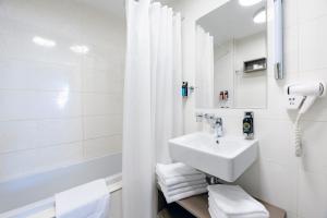 Koupelna v ubytování Hotel Větruše