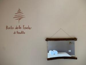 Kép Chalet Baita delle Favole di RosaRita szállásáról Berbenno di Valtellinában a galériában