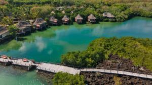 an aerial view of a resort on the water at Constance Prince Maurice in Post of Flacq