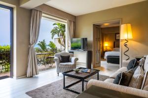 TV a/nebo společenská místnost v ubytování Hotel Villa Ducale