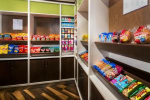 a walk in pantry with lots of food at Holiday Inn Palm Beach-Airport Conf Ctr, an IHG Hotel in West Palm Beach