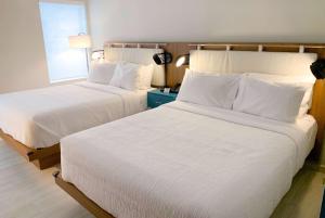 Voodi või voodid majutusasutuse TRYP by Wyndham Mayaguez toas