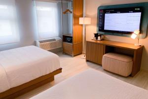 Voodi või voodid majutusasutuse TRYP by Wyndham Mayaguez toas