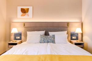 Postel nebo postele na pokoji v ubytování Hotel Europa