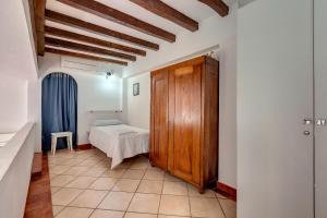 A bed or beds in a room at Ricasoli 17 G