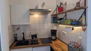 Küche/Küchenzeile in der Unterkunft Meiers FeWo