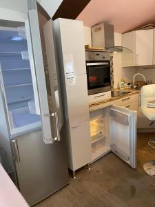 Kuchyň nebo kuchyňský kout v ubytování Apartments Ylona