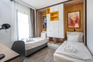 Postel nebo postele na pokoji v ubytování Zsóry Liget Camping & Resort