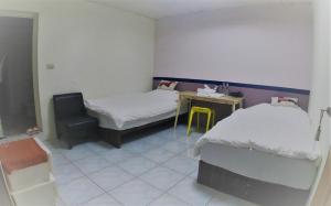 A bed or beds in a room at Together Stay