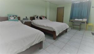 A bed or beds in a room at Together Stay