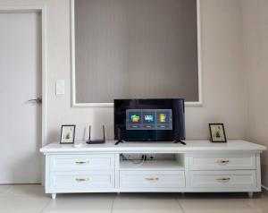 TV a/nebo společenská místnost v ubytování Cozy Suite @ I-City