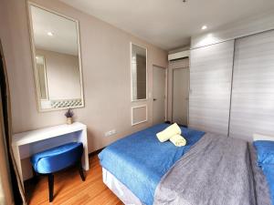 Postel nebo postele na pokoji v ubytování Cozy Suite @ I-City