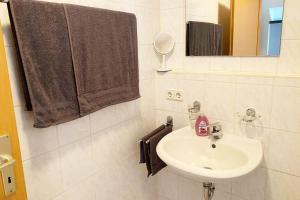 Koupelna v ubytování 1 Zimmer Apartment mit Balkon