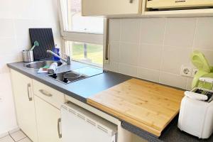 Kuchyň nebo kuchyňský kout v ubytování 1 Zimmer Apartment mit Balkon