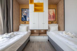 Postel nebo postele na pokoji v ubytování Zsóry Liget Camping & Resort