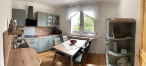 Kuchyň nebo kuchyňský kout v ubytování Haus Sonnenblick