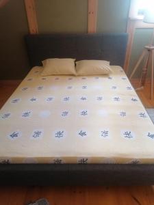 Postel nebo postele na pokoji v ubytování Medumi Lake Villa