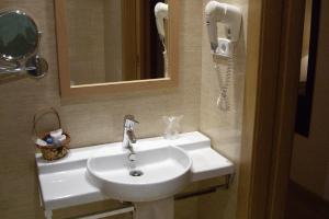 Koupelna v ubytování TCH Hotel