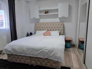 Posteľ alebo postele v izbe v ubytovaní Bob Residence & pool