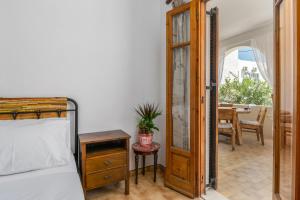 Ένα ή περισσότερα κρεβάτια σε δωμάτιο στο Grandpa's Yard
