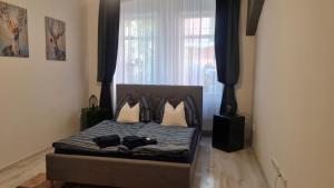 Postel nebo postele na pokoji v ubytování Apartment near Congress Centre I. + 23 fotografií
