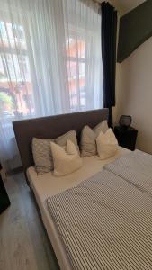 Postel nebo postele na pokoji v ubytování Apartment near Congress Centre I.